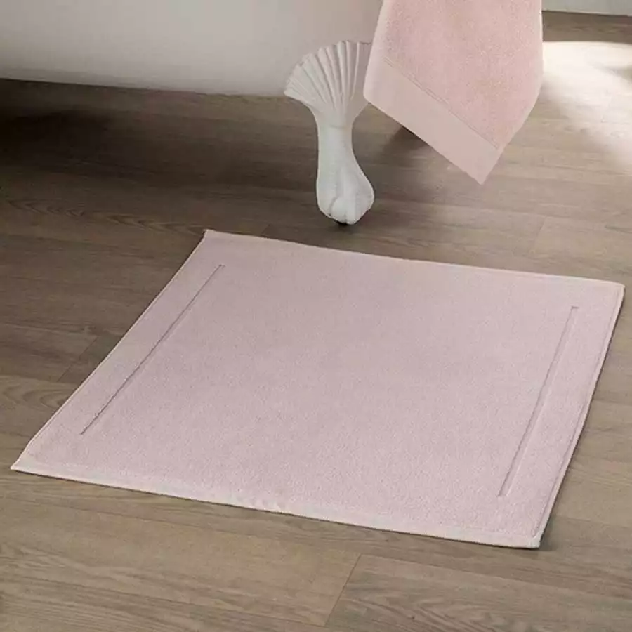 Tapis de bain en coton éponge rose clair