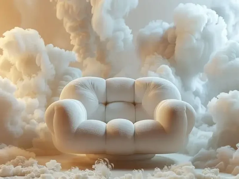 Canapé blanc aux formes arrondies esprit nuage devant un fond représentant la volupté des nuages
