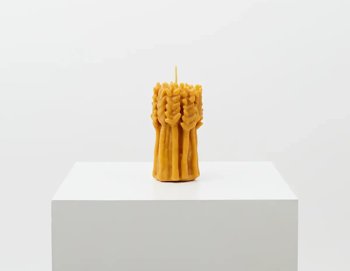 Bougie à l'effigie d'un bouquet de blés