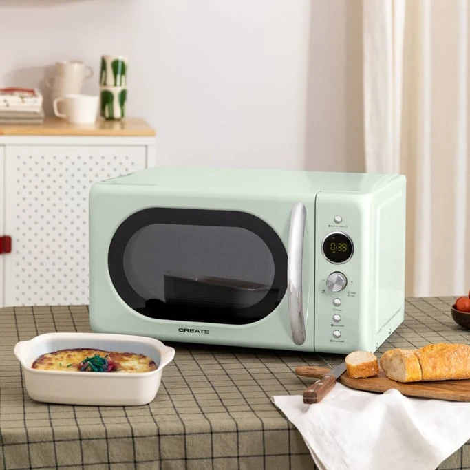 Micro-ondes rétro vert pastel avec poignée