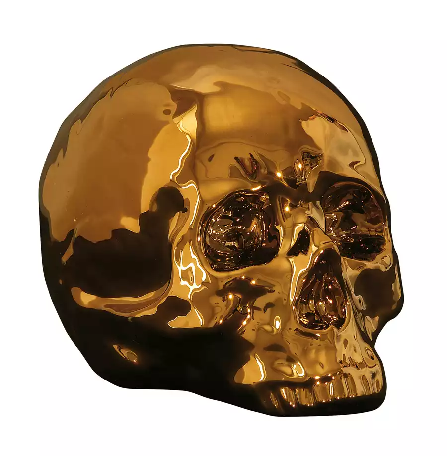 sculpture tête de mort en porcelaine dorée